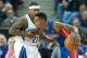 Nov 15, 2013; Sacramento, CA, USA; Detroit Pistons point guard Brandon Jennings (7) dribbles around Sacramento Kings point guard Isaiah Thomas (22) during the fourth quarter at Sleep Train Arena. The Detroit Pistons defeated the Sacramento Kings 97-90. Ma