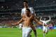 LISBON, PORTUGAL - MAY 24: Cristiano Ronaldo of Real Madrid celebrates with r21 after scoring their fourth goal from the penalty spot during the UEFA Champions League Final between Real Madrid and Atletico de Madrid at Estadio da Luz on May 24, 2014 in L