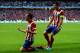LISBON, PORTUGAL - MAY 24: Diego Godin of Club Atletico de Madrid celebrates scoring the opening goal with Gabi of Club Atletico de Madrid during the UEFA Champions League Final between Real Madrid and Atletico de Madrid at Estadio da Luz on May 24, 2014