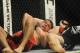 May 24, 2014; Las Vegas, NV, USA; Al Laquinta (red) struggles in a choke hold from his opponent Mitch Clarke (blue) during their UFC 173 lightweight bout at MGM Grand Garden Arena. Clarke won his bout by submission. Mandatory Credit: Stephen R. Sylvanie-U