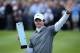 VIRGINIA WATER, ENGLAND - MAY 25: Rory McIlroy of Northern Ireland poses with the trophy following his victory at the end of day four of the BMW PGA Championship at Wentworth on May 25, 2014 in Virginia Water, England. (Photo by Warren Little/Getty Imag