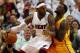 MIAMI, FL - MAY 24: LeBron James #6 of the Miami Heat drives to the basket against Lance Stephenson #1 of the Indiana Pacers during Game Three of the Eastern Conference Finals of the 2014 NBA Playoffs at American Airlines Arena on May 24, 2014 in Miami,
