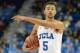Jan 23, 2014; Los Angeles, CA, USA; UCLA Bruins guard/forward Kyle Anderson (5) directs the offense in the second half against the Stanford Cardinal at Pauley Pavilion. UCLA won 91-74. Mandatory Credit: Jayne Kamin-Oncea-USA TODAY Sports