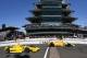 May 25, 2014; Indianapolis, IN, USA; IndyCar Series driver Ryan Hunter-Reay (28) crosses the start/finish line in front of Helio Castroneves (3) to win the 2014 Indianapolis 500 at Indianapolis Motor Speedway. Mandatory Credit: Mike Dinovo-USA TODAY Spor