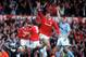 23 APR 1994: A PICTURE SHOWING ERIC CANTONA OF MANCHESTER UNITED FOOTBALL CLUB AS HE RUNS OFF WITH HIS ARM RAISED IN CELEBRATION AFTER SCORING THE FIRST GOAL IN HIS FIRST GAME AFTER HIS SUSPENSION AGAINST MANCESTER CITY IN THEIR PREMIER LEAGUE MATCH Mand
