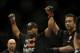 Feb 22, 2014; Las Vegas, NV, USA; Daniel Cormier (red gloves) celebrates his victory of Pactrick Cummins (not pictured) after their UFC light heavyweight bout at Mandalay Bay. Cormier won by way of a TKO in the first round. Mandatory Credit: Stephen R. S