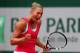 PARIS, FRANCE - MAY 27: Yanina Wickmayer of Belgium celebrates a point during her women's singles match against Caroline Wozniacki of Denmark on day three of the French Open at Roland Garros on May 27, 2014 in Paris, France. (Photo by Matthew Stockman/G