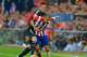 MADRID, SPAIN - APRIL 22: Fernando Torres of Chelsea and Miranda of Club Atletico de Madrid battle for the ball during the UEFA Champions League Semi Final first leg match between Club Atletico de Madrid and Chelsea at Vicente Calderon Stadium on April 2
