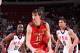 PORTLAND, OR - APRIL 7: Dario Saric #12 of the World Select Team drives against Shabazz Muhammad #10 and James Robinson #8 of the USA Junior Select Team during the 2012 Hoop Summit on April 7, 2012 at the Rose Garden Arena in Portland, Oregon. NOTE TO USE