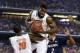 Apr 5, 2014; Arlington, TX, USA; Florida Gators center Patric Young (middle) controls a rebound against the Connecticut Huskies in the second half during the semifinals of the Final Four in the 2014 NCAA Mens Division I Championship tournament at AT&T Sta