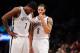NEW YORK, NY - DECEMBER 18: Joe Johnson #7 and Deron Williams #8 of the Brooklyn Nets talk during the second half against the Washington Wizards at Barclays Center on December 18, 2013 in the Brooklyn borough of New York City. The Wizards defeat the Nets