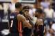 Dec 10, 2013; Indianapolis, IN, USA; Miami Heat forward LeBron James (6) talks to center Chris Bosh (1) and guard Dwayne Wade (3) during a game against the Indiana Pacers at Bankers Life Fieldhouse. Mandatory Credit: Brian Spurlock-USA TODAY Sports