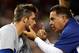 Dodgers trainer Stan Conte checks out Drew Butera.