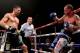 MANCHESTER, ENGLAND - NOVEMBER 23: Carl Froch bombards George Groves during their IBF and WBA World Super Middleweight bout at Phones4u Arena on November 23, 2013 in Manchester, England. (Photo by Scott Heavey/Getty Images)