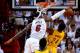 MIAMI, FL - MAY 30: LeBron James #6 of the Miami Heat defends against Paul George #24 of the Indiana Pacers during Game Six of the Eastern Conference Finals of the 2014 NBA Playoffs at American Airlines Arena on May 30, 2014 in Miami, Florida. NOTE TO U
