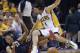 Scola tumbles over Battier. Veteran basketball.