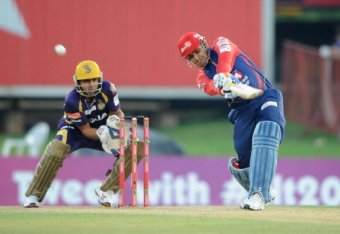 PRETORIA, SOUTH AFRCA - OCTOBER 13: Virender Sehwag (R) of the Daredevils bats as wicketkeeper Manvinder Bisla looks on during the Karbonn Smart CLT20 Group A match between Kolkata Knight Riders (IPL) and Delhi Daredevils (IPL) at SuperSport Park on Octo