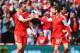 SOUTHAMPTON, ENGLAND - MAY 11: Rickie Lambert (L) of Southampton celebrates with team mate Adam Lallana (R) after scoring during the Barclays Premier League match between Southampton and Manchester United at St Mary's Stadium on May 11, 2014 in Southampt