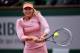 PARIS, FRANCE - MAY 28: Maria Sharapova of Russia returns a shot during her women's singles match against Tsvetana Pironkova of Bulgaria on day four of the French Open at Roland Garros on May 28, 2014 in Paris, France. (Photo by Matthias Hangst/Getty Im