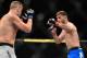 May 31, 2014; Sao Paulo, SP, BRAZIL; Stipe Miocic (red gloves) fights against Fabio Maldonado (blue gloves) during the TUF Brazil 3 Finale at Ibirapuera Gymnasium. Mandatory Credit: Jason Silva-USA TODAY Sports