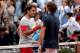 PARIS, FRANCE - JUNE 01: Roger Federer of Switzerland shakes hands with Ernests Gulbis of Latvia at the net following his defeat in their men's singles match on day eight of the French Open at Roland Garros on June 1, 2014 in Paris, France. (Photo by Ma