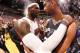 MIAMI, FL - JUNE 20: LeBron James #6 of the Miami Heat with Tim Duncan #21 of the San Antonio Spurs at the end of Game Seven of the 2013 NBA Finals on June 20, 2013 at American Airlines Arena in Miami, Florida. NOTE TO USER: User expressly acknowledges an