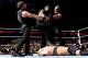 How Payback closed, The Shield towering over Triple H.