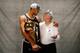 CLEVELAND - JUNE 14: (L-R) Tim Duncan #21 and head Gregg Popovich of the San Antonio Spurs pose for a photo with the Larry O'Brien Championship trophy after they won the 2007 NBA Championship with their 83-82 win against the Cleveland Cavaliers in Game F