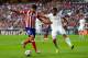 LISBON, PORTUGAL - MAY 24: Diego Costa of Club Atletico de Madrid is marshalled by Sami Khedira of Real Madrid during the UEFA Champions League Final between Real Madrid and Atletico de Madrid at Estadio da Luz on May 24, 2014 in Lisbon, Portugal. (Phot