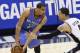 SAN ANTONIO, TX - MAY 21: Thabo Sefolosha #25 of the Oklahoma City Thunder holds the ball away from Danny Green #4 of the San Antonio Spurs in Game Two of the Western Conference Finals during the 2014 NBA Playoffs at the AT&T Center on May 21, 2014 in Sa