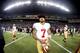SEATTLE, WA - JANUARY 19: Quarterback Colin Kaepernick #7 of the San Francisco 49ers walks off the field after losing to the Seattle Seahawks 23-17 during the 2014 NFC Championship at CenturyLink Field on January 19, 2014 in Seattle, Washington. (Photo