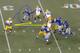 Rodgers gets the snap in the shotgun at the 35-yard line; after a five-step drop, he steps back up into the pocket and is sacked by Osi Umenyiora. The five-wide set out of the shotgun lacks protection.
