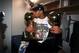SAN ANTONIO - 1999: Tim Duncan #21 of the San Antonio Spurs kisses one of his trophies in celebration of their championship win circa 1999 at the SBC Center in San Antonio, Texas. NOTE TO USER: User expressly acknowledges and agrees that, by downloading
