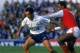LONDON - OCTOBER 18: Ossie Ardiles of Tottenham Hotspur shields the ball from David Rocastle of Arsenal during the Barclays League Division One match held on October 18, 1987 played at White Hart Lane, in London. Arsenal won the match 2-1. (Photo by Simo