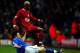 LIVERPOOL, ENGLAND - NOVEMBER 30: El Hadji Diouf of Liverpool clashes with Damien Johnson of Birmingham during the FA Barclaycard Premiership match between Liverpool and Birmingham City at Anfield on Novermber 30, 2003 in Liverpool, England. (Photo by Ga