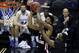 Mar 21, 2014; San Antonio, TX, USA; Louisiana Lafayette Ragin Cajuns guard Elfrid Payton (2) pulls down a rebound against the Creighton Bluejays in the second half of a men's college basketball game during the second round of the 2014 NCAA Tournament at A