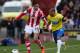 STOKE ON TRENT, ENGLAND - APRIL 12: Dan Gosling of Newcastle United competes with Geoff Cameron of Stoke City during the Barclays Premier League match between Stoke City and Newcastle United at Britannia Stadium on April 12, 2014 in Stoke on Trent, Engla