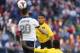 KANSAS CITY, KS - OCTOBER 11: Ryan Johnson #9 of Jamaica heads a shot over Geoff Cameron #20 of the U.S. Men's National Soccer Team in the first half at Sporting Park on October 11, 2013 in Kansas City, Kansas. (Photo by Kyle Rivas/Getty Images)