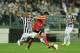 TURIN, ITALY - MAY 01: Arturo Vidal (L) of Juventus tackles Andre Gomes
of SL Benfica during the UEFA Europa League semi final match between Juventus and SL Benfica at Juventus Arena on May 1, 2014 in Turin, Italy. (Photo by Valerio Pennicino/Getty Ima