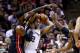 SAN ANTONIO, TX - JUNE 08: Kawhi Leonard #2 of the San Antonio Spurs looks to pass as LeBron James #6 of the Miami Heat defends during Game Two of the 2014 NBA Finals at the AT&T Center on June 8, 2014 in San Antonio, Texas. NOTE TO USER: User expressly
