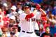 BOSTON, MA - JUNE 01: Garin Cecchini #70 of the Boston Red Sox stands at bat in his first MLB game against the Tampa Bay Rays during the game at Fenway Park on June 1, 2014 in Boston, Massachusetts. (Photo by Jared Wickerham/Getty Images)