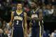 Mar 9, 2014; Dallas, TX, USA; Indiana Pacers guard Lance Stephenson (1) talks with guard George Hill (3) during a timeout in the second quarter against the Dallas Mavericks at American Airlines Center. Mandatory Credit: Matthew Emmons-USA TODAY Sports
