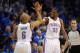 Apr 19, 2014; Oklahoma City, OK, USA; Oklahoma City Thunder guard Derek Fisher (6) slaps hands with forward Kevin Durant (35) after a play in action against the Memphis Grizzlies in game one during the first round of the 2014 NBA Playoffs at Chesapeake En