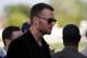 May 17, 2014; Baltimore, MD, USA; New England Patriots quarterback Tom Brady walks out of the infield after the 139th Preakness Stakesat Pimlico Race Course. Mandatory Credit: Winslow Townson-USA TODAY Sports