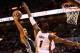 MIAMI, FL - JUNE 10: Danny Green #4 of the San Antonio Spurs goes to the basket against Chris Bosh #1 of the Miami Heat during Game Three of the 2014 NBA Finals at American Airlines Arena on June 10, 2014 in Miami, Florida. NOTE TO USER: User expressly a