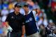 PINEHURST, NC - JUNE 12: (L-R) Phil Mickelson of the United States talks with caddie Jim 'Bones' Mackay on the 13th tee during the first round of the 114th U.S. Open at Pinehurst Resort & Country Club, Course No. 2 on June 12, 2014 in Pinehurst, North Car