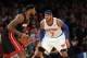 Jan 9, 2014; New York, NY, USA; New York Knicks small forward Carmelo Anthony (7) defends Miami Heat small forward LeBron James (6) during the fourth quarter of a game at Madison Square Garden. Mandatory Credit: Brad Penner-USA TODAY Sports