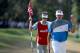PINEHURST, NC - JUNE 12: Bubba Watson of the United States waves to the gallery on the 17th hole during the first round of the 114th U.S. Open at Pinehurst Resort & Country Club, Course No. 2 on June 12, 2014 in Pinehurst, North Carolina. (Photo by Ross