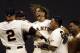 Michael Morse, (center), celebrates his walk-off hit against the Mets to give the Giants a victory.