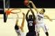 Mar 23, 2014; San Diego, CA, USA; Gonzaga Bulldogs forward/center Sam Dower (35) has his shot blocked by Arizona Wildcats guard Nick Johnson (13) as forward Aaron Gordon (11) looks on during a men's college basketball game during the third round of the 20